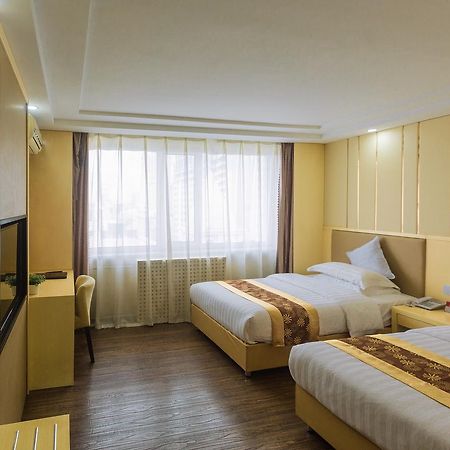 Beiguo Zhichun Business Hotel Манжули Екстериор снимка